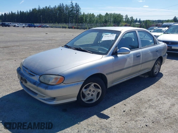 2001 Kia Sephia z VIN KNAFB121515092630, wystawiony jako IAAI lot #42361635 z przebiegiem 183 434 mil mil oraz . Historia ofert i sprzedaży dostępna na DreamBid. Obrazek 2.