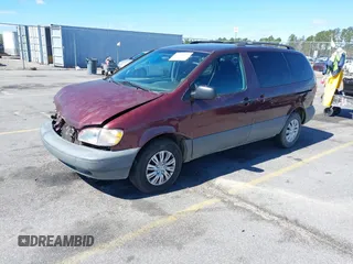 1999 Toyota Sienna LE with VIN 4T3ZF13C1XU112717, listed as a IAAI auction lot 41725827 with 272,639 mi miles. Bid and sale history available at carsss.com. Image 2.