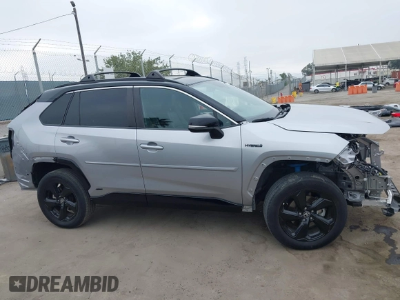 2021 Toyota RAV4 Hybrid XSE z VIN 4T3E6RFV9MU027713, wystawiony jako IAAI lot #42587759 z przebiegiem 28 806 mil mil oraz . Historia ofert i sprzedaży dostępna na DreamBid. Obrazek 14.