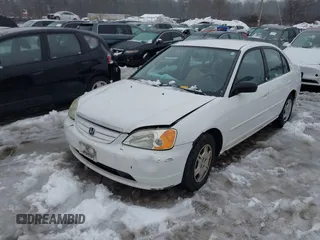 2002 Honda Civic LX with VIN 2HGES16592H517516, listed as a IAAI auction lot 41516218 with 146,957 mi miles and . Bid and sale history available at DreamBid. Image 2.