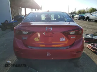 2015 Mazda 3 S Touring with VIN JM1BM1V32F1230325, listed as a Copart auction lot 54427335 with 94,661 mi miles and Salvage Title. Bid and sale history available at DreamBid. Image 6.