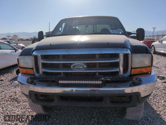 1999 Ford F-250 XL with VIN 1FTNX21FXXEC98957, listed as a Copart auction lot 61476665 with 414,070 mi miles and Salvage title. Bid and sale history available at DreamBid. Image 5.