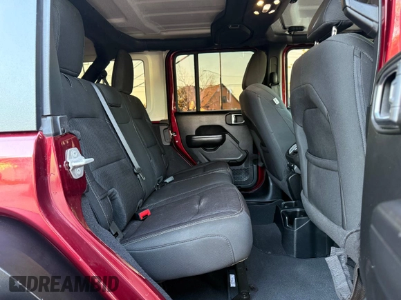2021 Jeep Wrangler Unlimited Willys with VIN 1C4HJXDNXMW680247, listed as a Copart auction lot 57000145 with 77,407 mi miles and Clean Title. Bid and sale history available at DreamBid. Image 6.