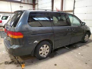 2003 Honda Odyssey EX with VIN 2HKRL18603H008412, listed as a Copart auction lot 87502365 with 352,773 mi miles and Salvage Title. Bid and sale history available at DreamBid. Image 3.