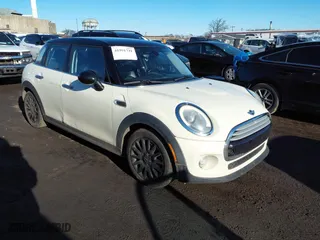 2015 MINI Cooper Hardtop 4 Door with VIN WMWXS5C50FT829068, listed as a IAAI auction lot 41591731 with 108,598 mi miles. Bid and sale history available at carsss.com. Image 1.