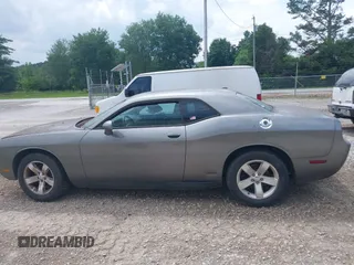 2011 Dodge Challenger z VIN 2B3CJ4DG9BH570295, wystawiony jako IAAI lot #42288192 z przebiegiem 162 094 mil mil oraz . Historia ofert i sprzedaży dostępna na DreamBid. Obrazek 14.