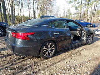 2017 Nissan Maxima SV z VIN 1N4AA6AP9HC399703, wystawiony jako IAAI lot #41858782 z przebiegiem 89 131 mil mil oraz . Historia ofert i sprzedaży dostępna na DreamBid. Obrazek 4.