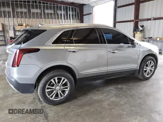 2023 Cadillac XT5 AWD Premium Luxury with VIN 1GYKNDR49PZ222592, listed as a Copart auction lot 79759624 with 32,177 mi miles and Clean Title. Bid and sale history available at DreamBid. Image 3.