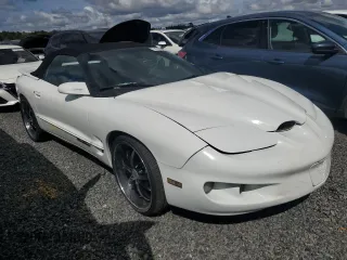 2001 Pontiac Firebird Firebird z VIN 2G2FS32K912126317, wystawiony jako Copart lot #74510454 z przebiegiem Nie podano mil oraz Szkody całkowita. Historia ofert i sprzedaży dostępna na DreamBid. Obrazek 4.