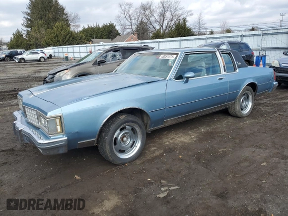 1985 Oldsmobile 88 z VIN 1G3BY37Y7FY316231, wystawiony jako Copart lot #43851075 z przebiegiem 82 641 mil mil oraz Czysty tytuł • Clean title. Historia ofert i sprzedaży dostępna na DreamBid. Obrazek 1.