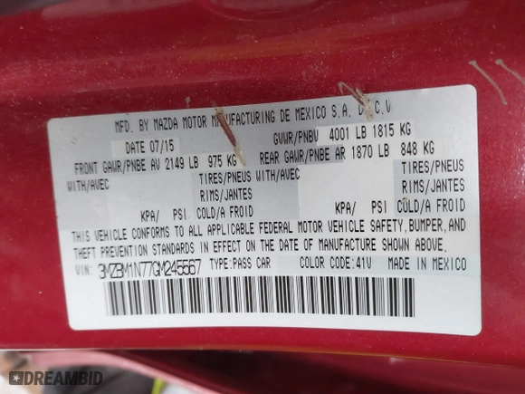 2016 Mazda Mazda3 i Grand Touring with VIN 3MZBM1N77GM245567, listed as a IAAI auction lot 41330883 with 128,423 mi miles. Bid and sale history available at carsss.com. Image 9.
