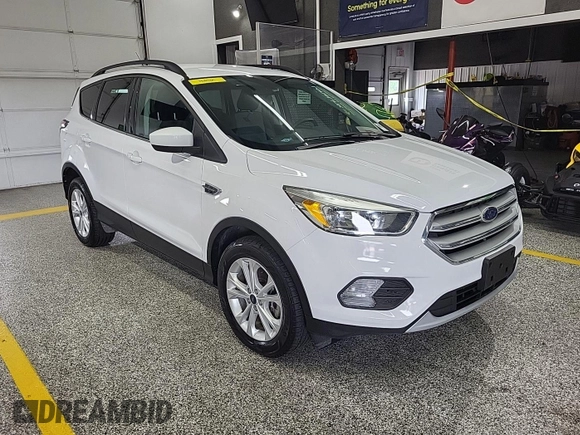 2018 Ford Escape SE z VIN 1FMCU9GD4JUA76194, wystawiony jako IAAI lot #42421138 z przebiegiem 47 896 mil mil oraz . Historia ofert i sprzedaży dostępna na DreamBid. Obrazek 5.