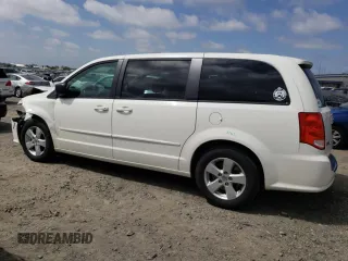 2013 Dodge Grand Caravan SE with VIN 2C4RDGBG3DR560962, listed as a Copart auction lot 53690225 with 124,796 mi miles and Salvage Title. Bid and sale history available at DreamBid. Image 2.