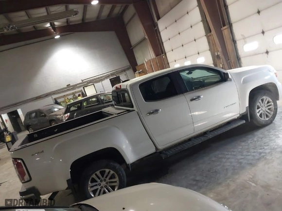 2016 GMC Canyon 4WD SLT with VIN 1GTG6DE31G1284833, listed as a IAAI auction lot 41421843 with 112,593 mi miles. Bid and sale history available at carsss.com. Image 4.