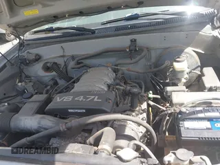 2004 Toyota Tundra SR5 with VIN 5TBDT44174S434897, listed as a IAAI auction lot 42128806 with 218,054 mi miles and . Bid and sale history available at DreamBid. Image 10.