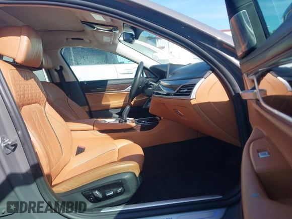 2020 BMW 7 Series 740i xDrive with VIN WBA7T4C04LGF97187, listed as a IAAI auction lot 42505343 with 70,709 mi miles and . Bid and sale history available at DreamBid. Image 5.