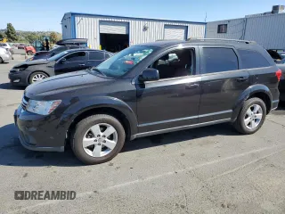 2012 Dodge Journey SXT with VIN 3C4PDCBGXCT290396, listed as a Copart auction lot 63418555 with 165,094 mi miles and Clean title. Bid and sale history available at DreamBid. Image 1.