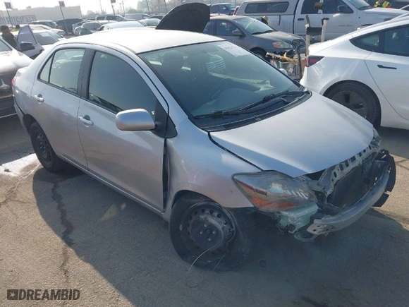 2010 Toyota Yaris with VIN JTDBT4K37A4076727, listed as a IAAI auction lot 41023533 with 102,494 mi miles. Bid and sale history available at carsss.com. Image 1.