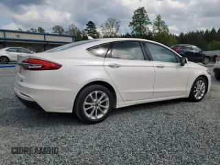 2020 Ford Fusion Hybrid SE with VIN 3FA6P0LUXLR184992, listed as a Copart auction lot 52674565 with 59,742 mi miles and Salvage Title. Bid and sale history available at carsss.com. Image 3.