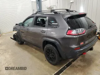 2019 Jeep Cherokee Trailhawk Elite с VIN 1C4PJMBN6KD162156, выставлен на аукционе Copart как лот 83041704 с пробегом 100 616 миль миль и Списание • Salvage title. История ставок и продаж доступна на DreamBid. Изображение 2.