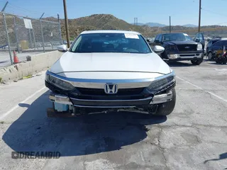 2021 Honda Accord Touring with VIN 1HGCV3F95MA000714, listed as a IAAI auction lot 42350127 with 69,731 mi miles and . Bid and sale history available at DreamBid. Image 13.