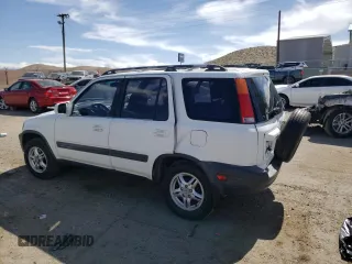 1999 Honda CR-V EX with VIN JHLRD186XXC076864, listed as a Copart auction lot 54567194 with 247,204 mi miles and Salvage Title. Bid and sale history available at carsss.com. Image 2.