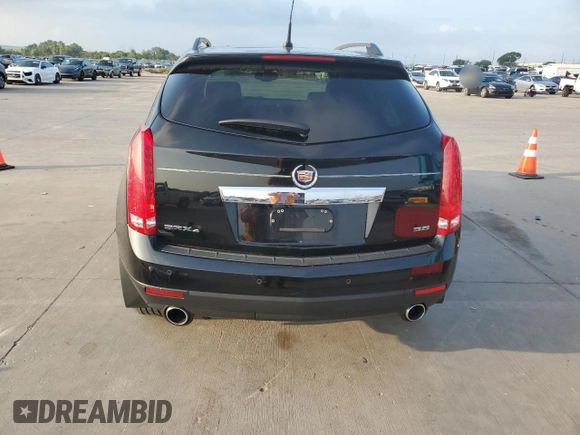2013 Cadillac SRX Performance Collection с VIN 3GYFNHE39DS506349, выставлен на аукционе Copart как лот 63289244 с пробегом 111 673 миль миль и Списание • Salvage title. История ставок и продаж доступна на DreamBid. Изображение 6.