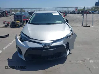 2019 Toyota Corolla L with VIN 5YFBURHE5KP877691, listed as a IAAI auction lot 42108591 with 85,813 mi miles and . Bid and sale history available at DreamBid. Image 12.