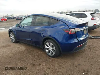 2023 Tesla Model Y Long Range with VIN 7SAYGDEE6PF947827, listed as a IAAI auction lot 41443524 with 12,381 mi miles and . Bid and sale history available at DreamBid. Image 3.