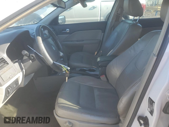 2010 Ford Fusion SEL with VIN 3FAHP0JA4AR392509, listed as a Copart auction lot 45649565 with 210,505 mi miles and Salvage Title. Bid and sale history available at DreamBid. Image 7.