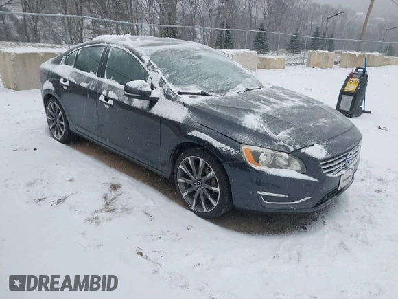 2015 Volvo S60 T5 Premier with VIN YV1612TK6F1348608, listed as a IAAI auction lot 41229153 with 73,019 mi miles. Bid and sale history available at carsss.com. Image 1.