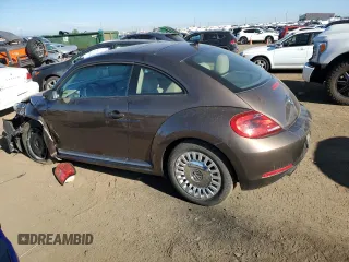 2015 Volkswagen Beetle with VIN 3VWH17AT3FM604193, listed as a Copart auction lot 72023304 with 49,958 mi miles and Salvage Title. Bid and sale history available at DreamBid. Image 2.