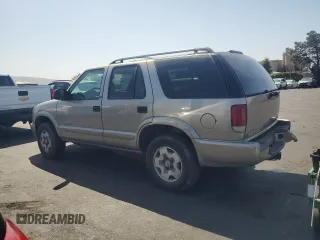 2002 Chevrolet Blazer LS с VIN 1GNDT13W02K126453, выставлен на аукционе Copart как лот 62340355 с пробегом 287 687 миль миль и Списание • Salvage title. История ставок и продаж доступна на DreamBid. Изображение 2.