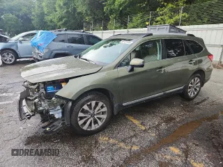 2017 Subaru Outback Touring with VIN 4S4BSETC1H3313344, listed as a Copart auction lot 59727455 with 105,487 mi miles and Salvage title. Bid and sale history available at DreamBid. Image 1.