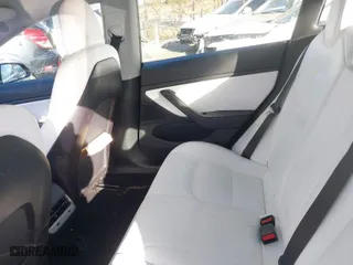 2019 Tesla Model 3 Mid Range with VIN 5YJ3E1EA4KF317872, listed as a IAAI auction lot 41491269 with 90,772 mi miles. Bid and sale history available at carsss.com. Image 8.
