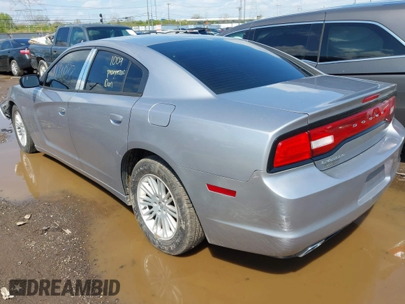 2013 Dodge Charger SE with VIN 2C3CDXBG7DH742812, listed as a IAAI auction lot 41991577 with 124,057 mi miles and . Bid and sale history available at DreamBid. Image 3.