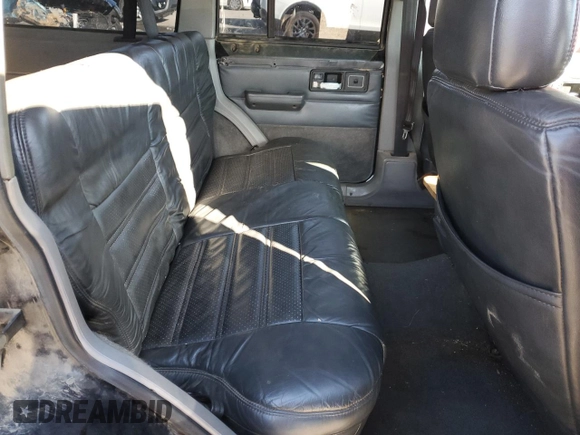1996 Jeep Cherokee z VIN 1J4FN78S8TL160974, wystawiony jako Copart lot #83425604 z przebiegiem 336 313 mil mil oraz Szkoda całkowita • Salvage title. Historia ofert i sprzedaży dostępna na DreamBid. Obrazek 12.