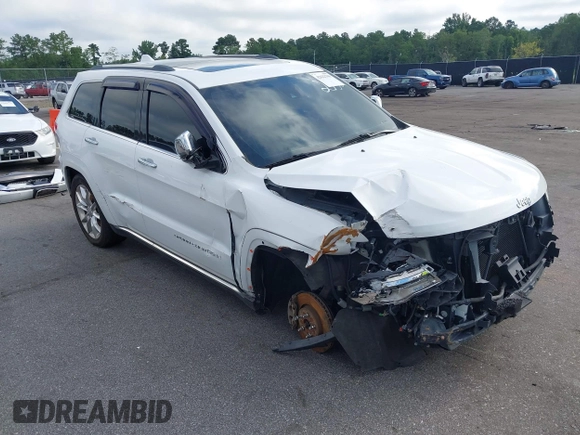 2014 Jeep Grand Cherokee Summit with VIN 1C4RJFJT2EC501235, listed as a IAAI auction lot 42622790 with 160,000 mi miles and . Bid and sale history available at DreamBid. Image 1.
