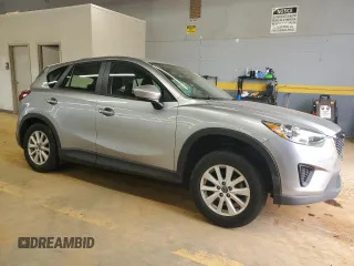 2013 Mazda CX-5 Sport with VIN JM3KE2BE6D0110272, listed as a Copart auction lot 57570725 with 124,475 mi miles and Salvage title. Bid and sale history available at DreamBid. Image 4.