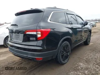 2021 Honda Pilot Special Edition with VIN 5FNYF6H23MB004612, listed as a IAAI auction lot 41734947 with 115,295 mi miles and . Bid and sale history available at DreamBid. Image 4.