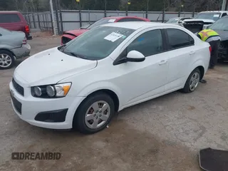 2014 Chevrolet Sonic LS z VIN 1G1JA5SH9E4180377, wystawiony jako IAAI lot #41839198 z przebiegiem 156 357 mil mil oraz . Historia ofert i sprzedaży dostępna na DreamBid. Obrazek 17.