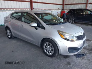 2015 Kia Rio LX with VIN KNADM4A3XF6520862, listed as a IAAI auction lot 41961939 with 89,991 mi miles. Bid and sale history available at carsss.com. Image 1.