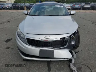 2013 Kia Optima EX z VIN 5XXGN4A79DG217554, wystawiony jako Copart lot #59667065 z przebiegiem 102 482 mil mil oraz Szkoda całkowita • Salvage title. Historia ofert i sprzedaży dostępna na DreamBid. Obrazek 5.