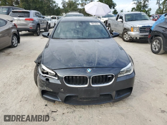 2016 BMW M5 z VIN WBSFV9C51GD595430, wystawiony jako Copart lot #79675834 z przebiegiem 82 351 mil mil oraz Szkoda całkowita • Salvage title. Historia ofert i sprzedaży dostępna na DreamBid. Obrazek 5.