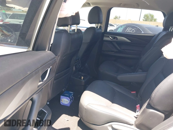 2023 Mazda CX-9 Touring Plus with VIN JM3TCBAY7P0636047, listed as a IAAI auction lot 42309618 with 20,821 mi miles and . Bid and sale history available at DreamBid. Image 8.