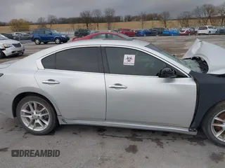 2014 Nissan Maxima SV with VIN 1N4AA5AP5EC460941, listed as a IAAI auction lot 40748781 with 130,872 mi miles and . Bid and sale history available at DreamBid. Image 13.