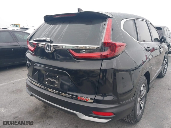2020 Honda CR-V LX with VIN 7FARW1H24LE011269, listed as a IAAI auction lot 41216714 with 34,777 mi miles. Bid and sale history available at carsss.com. Image 4.