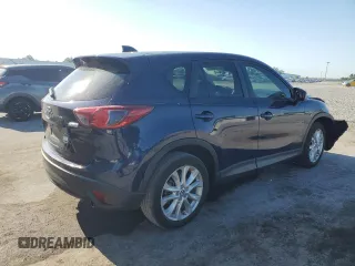 2014 Mazda CX-5 Grand Touring with VIN JM3KE2DY8E0361108, listed as a Copart auction lot 52876965 with 116,135 mi miles and Salvage Title. Bid and sale history available at carsss.com. Image 3.
