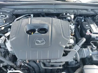 2023 Mazda CX-30 S Premium with VIN 3MVDMBDM7PM528297, listed as a IAAI auction lot 41637542 with 48,935 mi miles and . Bid and sale history available at DreamBid. Image 10.