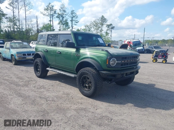 2023 Ford Bronco with VIN 1FMEE5DP5PLB15371, listed as a IAAI auction lot 41911126 with 32,091 mi miles. Bid and sale history available at carsss.com. Image 1.